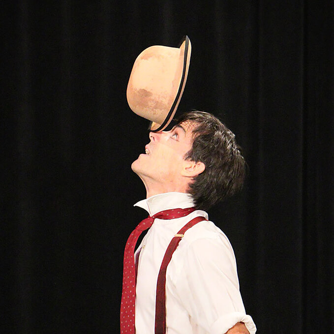 Peter Davison balancing hat